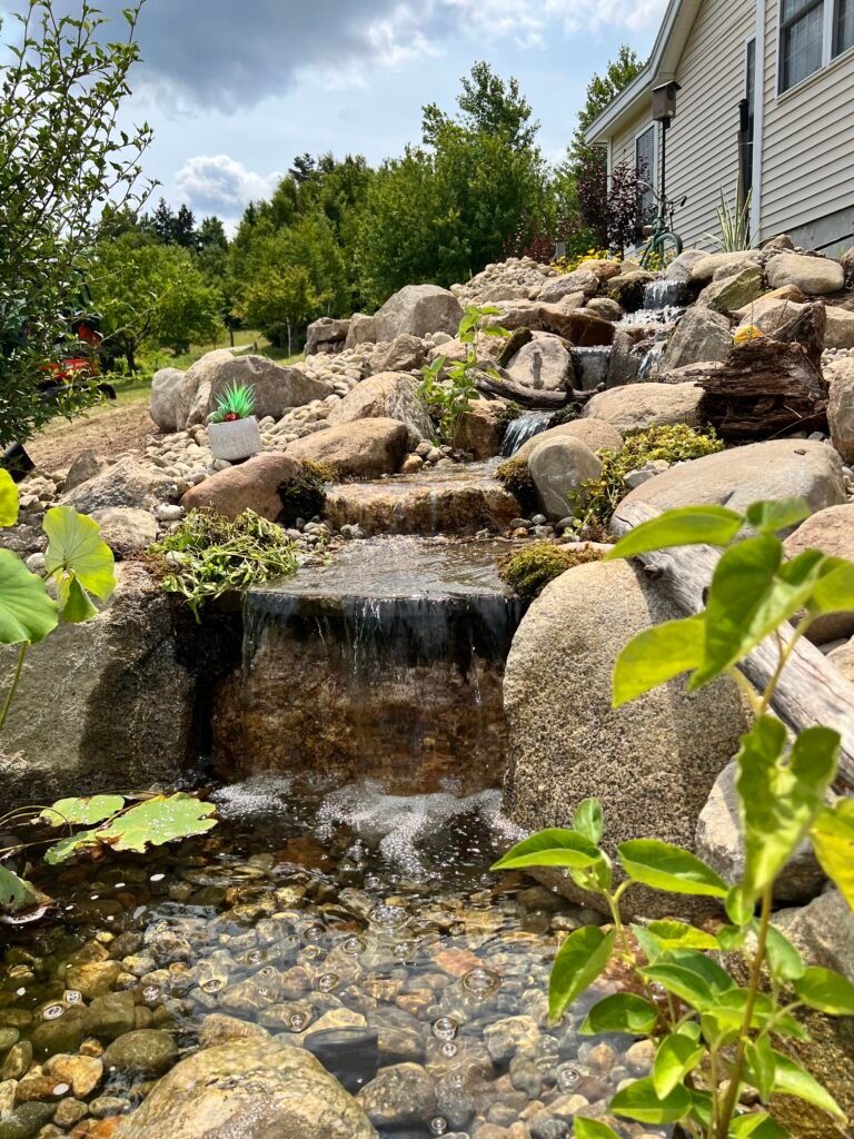 Pondless waterfall with plants