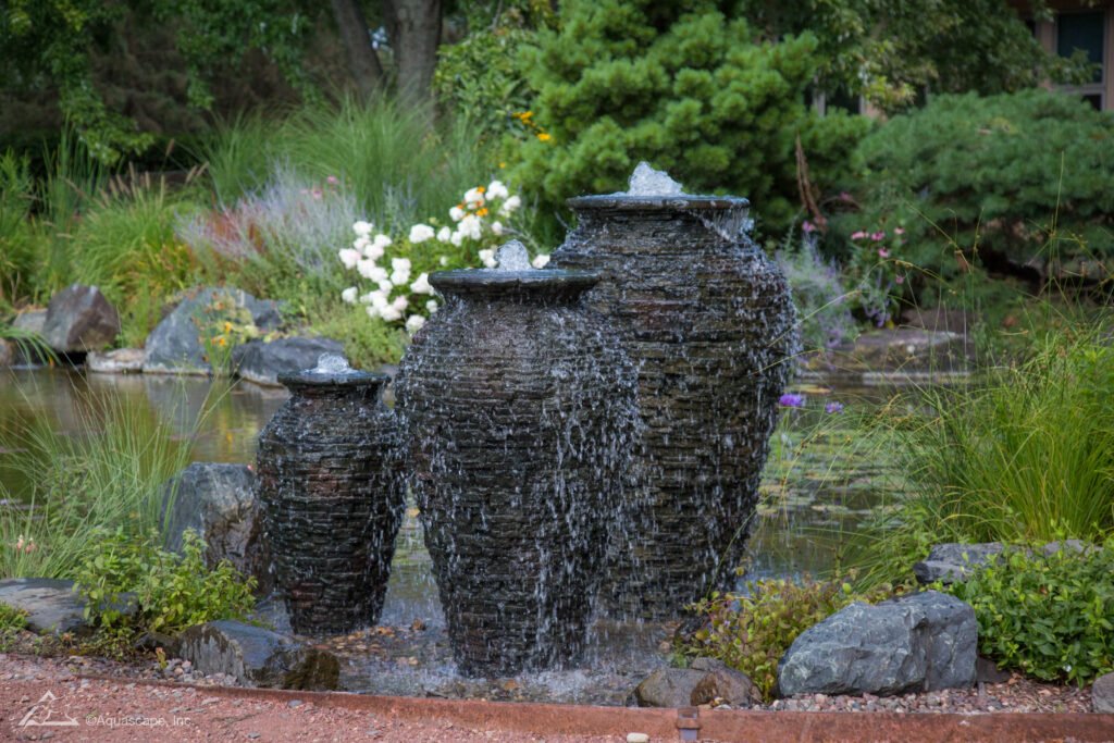 trio of stacked slate urns