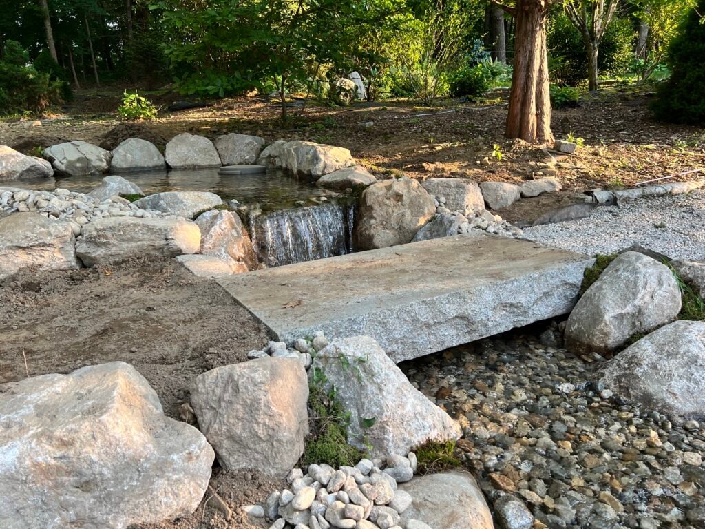 Greenland NH - Large Koi Pond 3 Greenland NH Stone Bridge with Waterfall